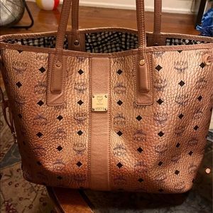Used rose gold MCM bag